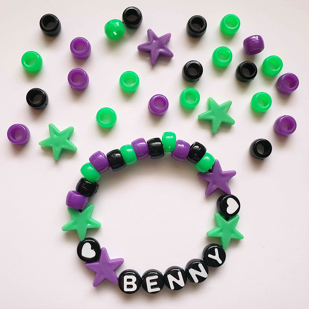 a chunky plastic-beaded bracelet themed after another player's original character