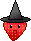 a strawberry with a witch hat