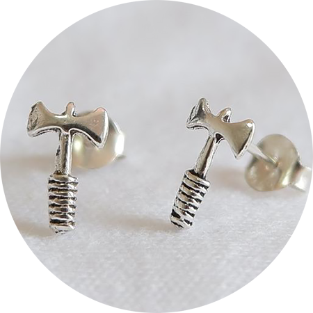 silver stud earrings shaped like battleaxes
