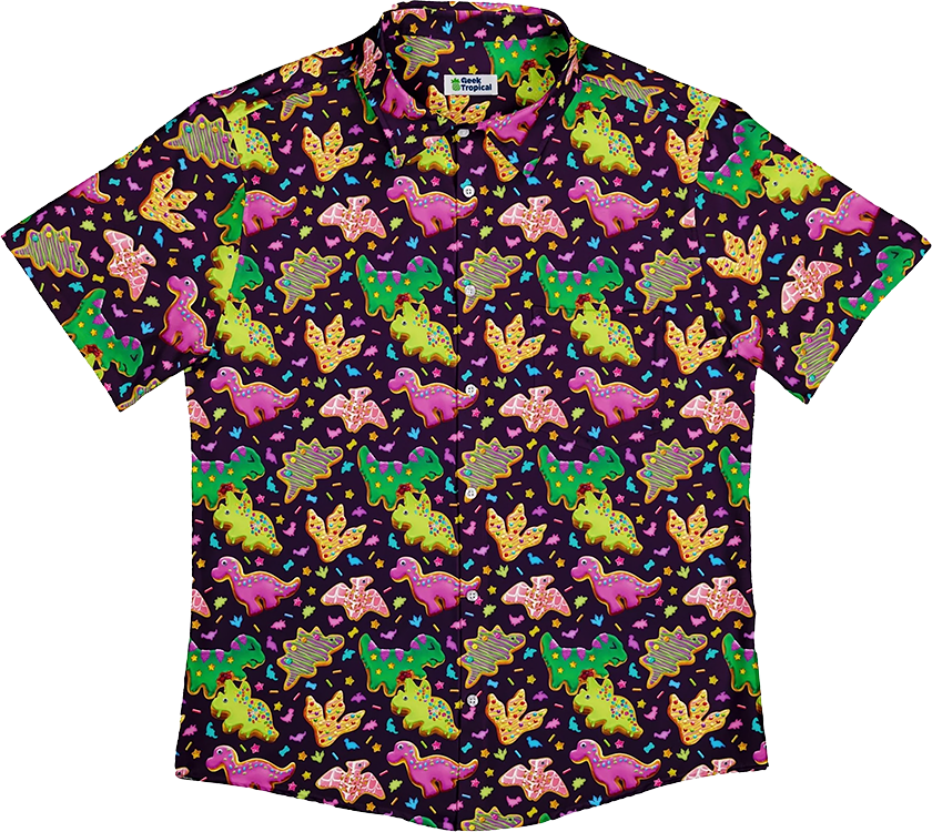 a short-sleeved, purple shirt with images of brightly-colored dinosaur cookies decorating it