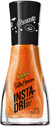 a bottle of orange shimmer nail polish