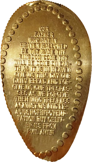 a smashed dime featuring The Lord's Prayer