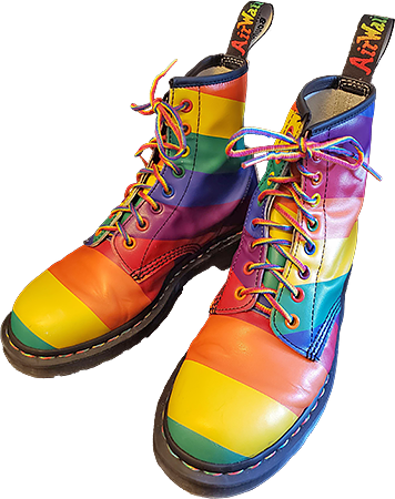 a pair of rainbow Doc Martens boots