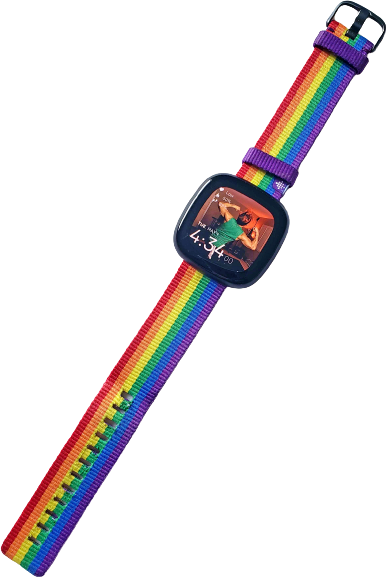 a Fitbit smartwatch with a woven rainbow band