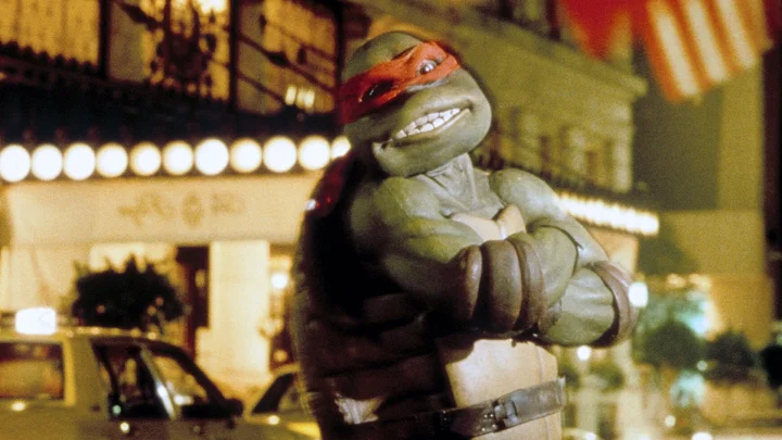 Promo pic of Raphael smiling for the camera